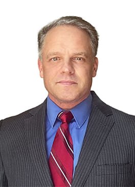 A photograph of Eric Lurie, Director, Business Development of PCI-GS